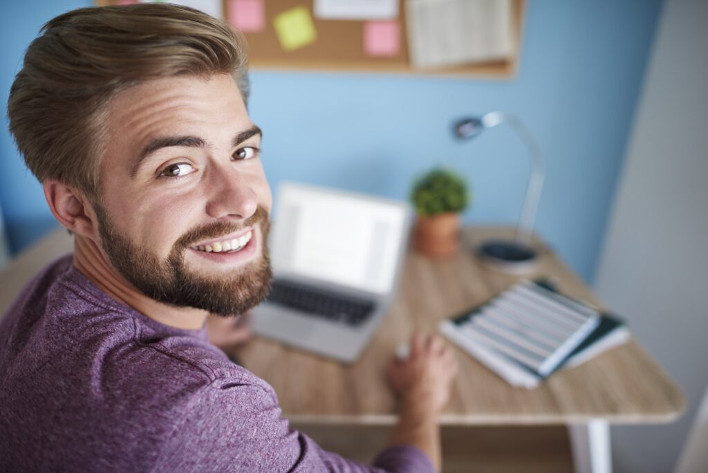 Portrait of man working on the computer