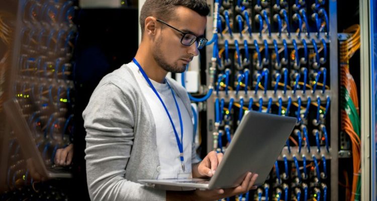 Man Managing Supercomputer Servers