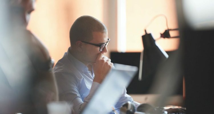 startup business, software developer working on computer