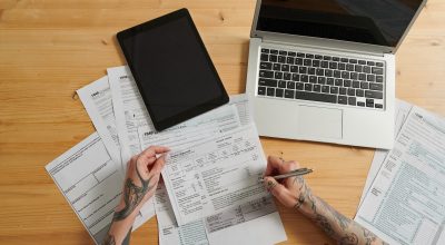 Woman paying for bills online Woman paying for bills online